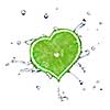 heart from lime dropped into water isolated on white