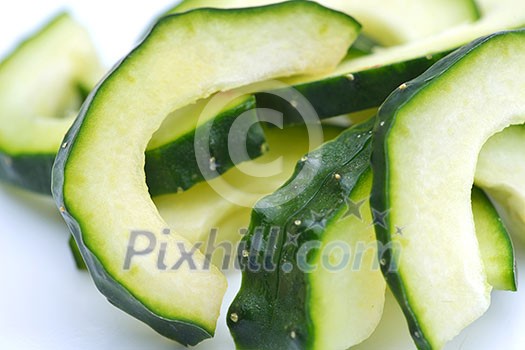 salad cucumber vegetable green closeup isolated on white background salad cucumber vegetable green closeup isolated on white background