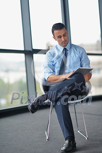 happy young business man work in modern office on computer happy young business man work in modern office on computer