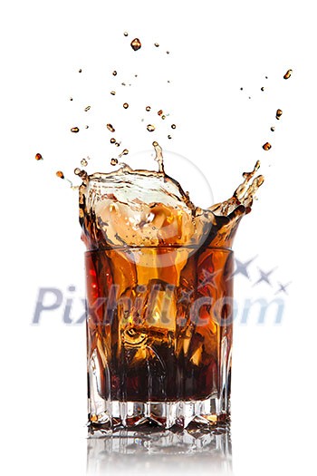 splash of cola in glass isolated on white splash of cola in glass isolated on white
