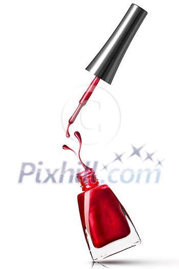 red nail polish bottle with splash isolated on white