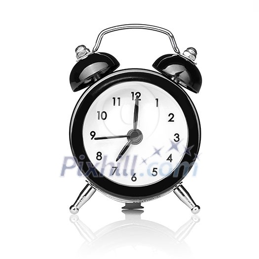 Black old style alarm clock isolated on white