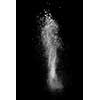 White powder explosion isolated on black background