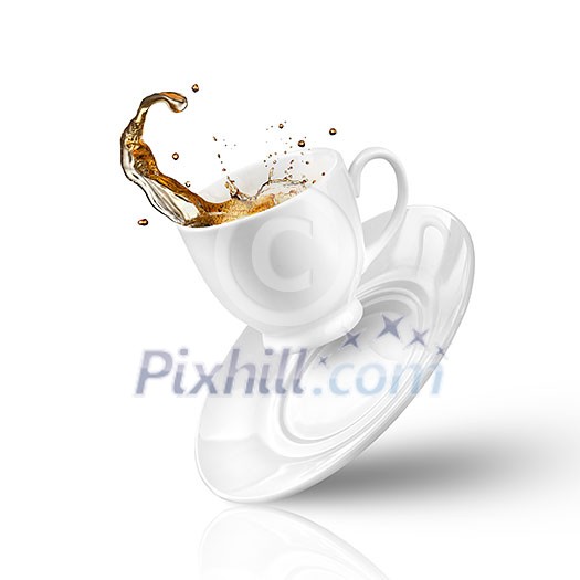 Splash of tea in the falling cup isolated on white