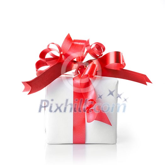 Holiday gift with red ribbon isolated on white