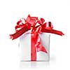 Holiday gift with red ribbon isolated on white