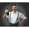 Cheerful man with a beer bottle. Concept - oktoberfest.