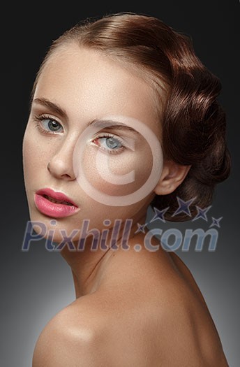 Beauty Girl. Portrait of Beautiful Young Woman looking at Camera. Fresh Clean Skin.