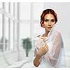 Portrait of Beautiful Young Fashion Bride in interior.