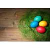 Easter eggs on wooden background.