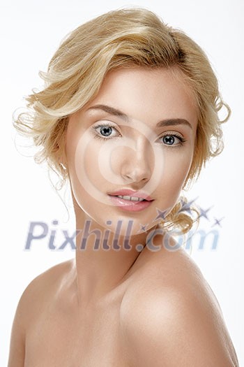 Charming blonde with clean skin. Soft skin. Looking at the camera. Isolated on white. Charming blonde with clean skin. Soft skin. Looking at the camera. Isolated on white.