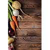 Fresh vegetables on a wooden table. Rustic style. Vegetarianism. Organic food. Space for text.