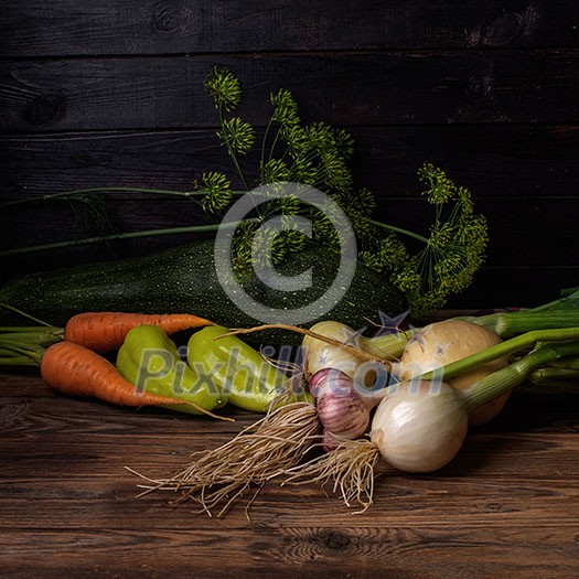 Fresh vegetables on a wooden table. Rustic style. Vegetarianism. Organic food. Space for text. Fresh vegetables on a wooden table. Rustic style. Vegetarianism. Organic food. Space for text.
