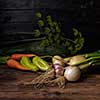 Fresh vegetables on a wooden table. Rustic style. Vegetarianism. Organic food. Space for text.