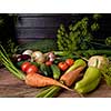 Fresh vegetables on a wooden table. Rustic style. Vegetarianism. Organic food. 