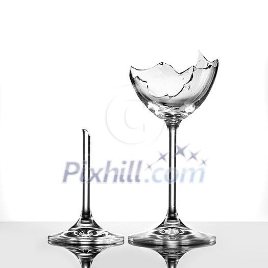 Broken wineglasses isolated on white