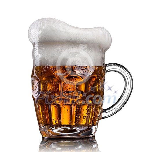 Beer in glass with water drops isolated on white 