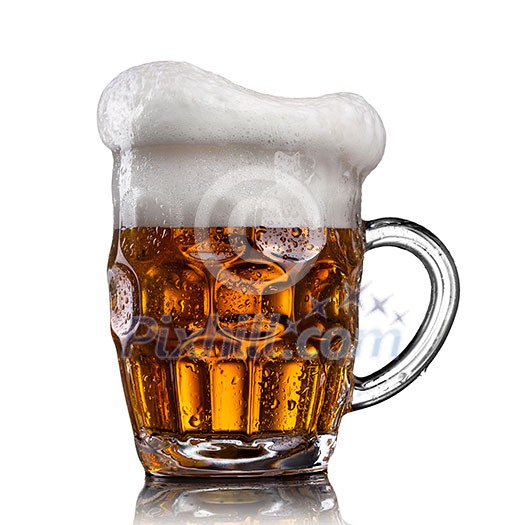 Beer in glass with water drops isolated on white Beer in glass with water drops isolated on white