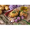 Sliced baked potatoes over wooden background. Rustic style.