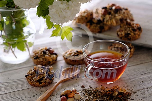 Cup of tea and cookies made of nuts and raisins. Kozinaki. Cup of tea and cookies made of nuts and raisins. Kozinaki.