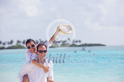 happy young romantic couple in love have fun running and relaxing on beautiful beach happy young romantic couple in love have fun running and relaxing on beautiful beach