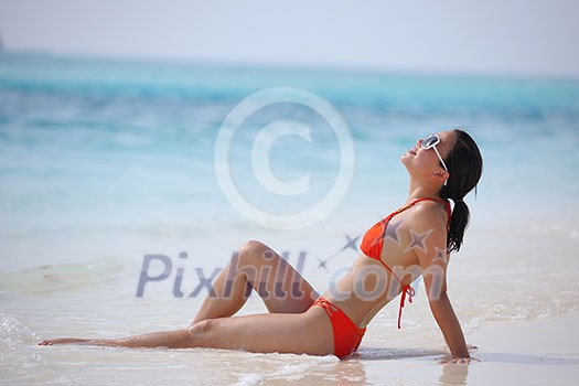 beautiful and happy woman girl on beach have fun and relax on summer vacation over the sea beautiful and happy woman girl on beach have fun and relax on summer vacation over the sea