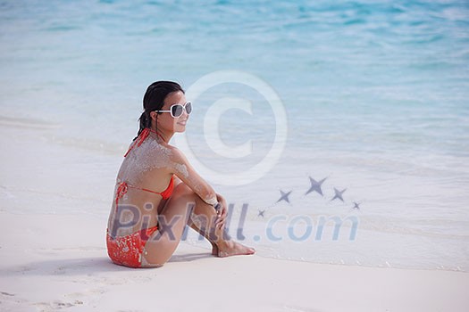 beautifel and happy woman girl on beach have fun and relax on summer vacation over the sea beautifel and happy woman girl on beach have fun and relax on summer vacation over the sea