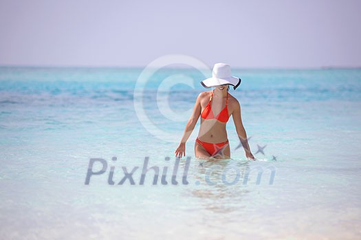 beautiful and happy woman girl on beach have fun and relax on summer vacation over the sea beautiful and happy woman girl on beach have fun and relax on summer vacation over the sea