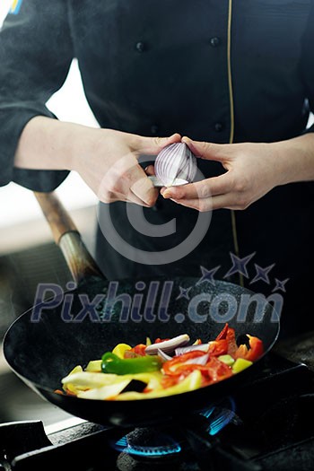 beautiful young chef woman prepare and decorating tasty food in kitchen