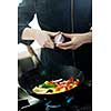 beautiful young chef woman prepare and decorating tasty food in kitchen