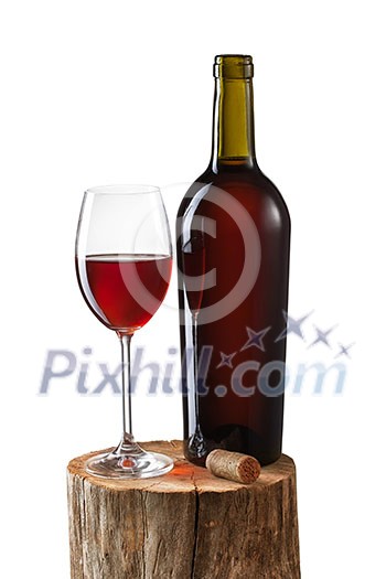 Glass of red wine and bottle on stump isolated on white