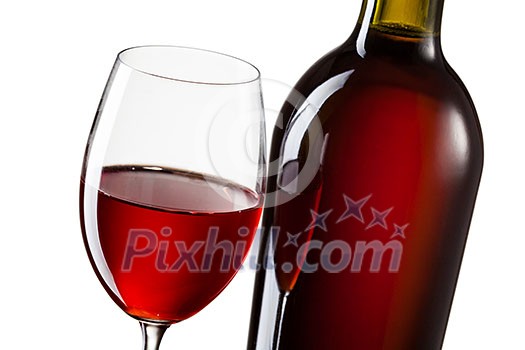 Glass of red wine and bottle isolated on white