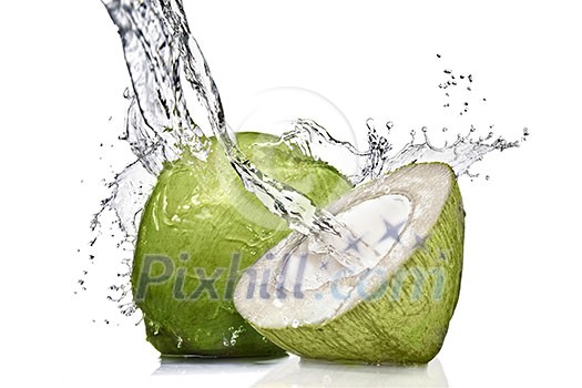 splash of water on green coconut isolated on white
