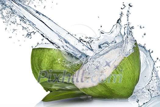 Green coconut with water splash isolated on white