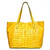 luxury yellow leather female bag isolated on white