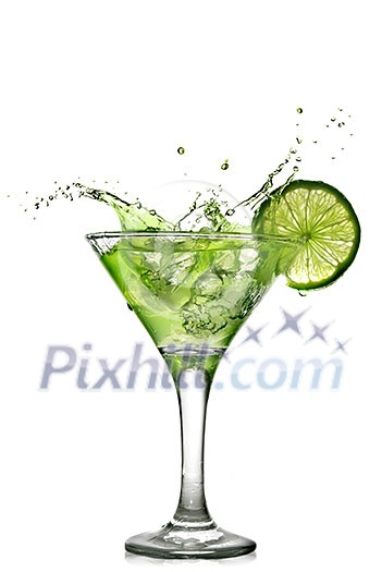 Green alcohol cocktail with splash and green lime isolated on white Green alcohol cocktail with splash and green lime isolated on white