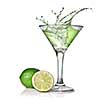 Green alcohol cocktail with splash and green lime isolated on white