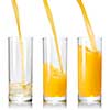Pouring orange juice into the glass isolated on white