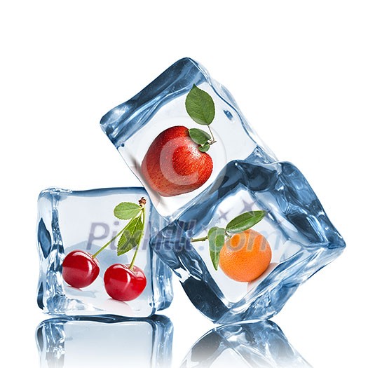 fruits in ice cubes isolated on white