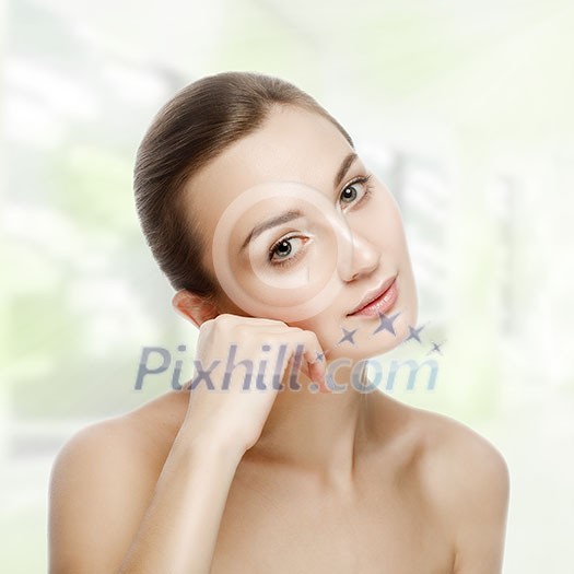 Beautiful girl sitting in tranquility. SPA concept. Skin Care. Young skin.