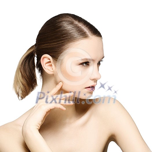 Beauty Portrait. Beautiful Woman Touching her Face. Perfect Fresh Skin. Isolated on White Background. Pure Beauty Model. Youth and Skin Care Concept