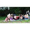 happy children group  have fun outdoor in nature at suny day