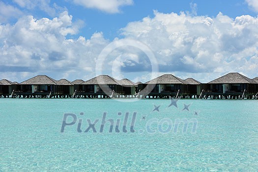 tropical water home villas resort on Maldives island at summer vacation tropical water home villas resort on Maldives island at summer vacation