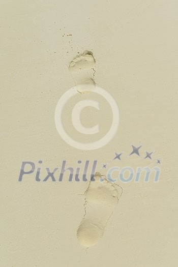 footsteps on beautiful white sand beach at summer vacation footsteps on beautiful white sand beach at summer vacation