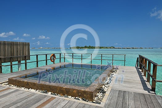 tropical water home villas resort on Maldives island at summer vacation tropical water home villas resort on Maldives island at summer vacation