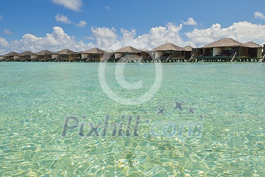 tropical water home villas resort on Maldives island at summer vacation tropical water home villas resort on Maldives island at summer vacation