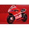 fast sport racing motorbike with copyspace and red background representing speed and power concept