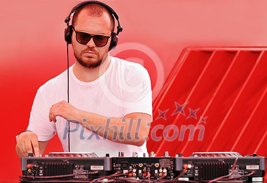 music dj play live on party disco conceprt on red background