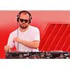 music dj play live on party disco conceprt on red background