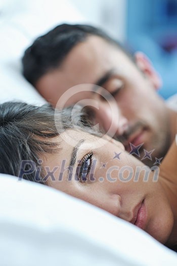 happy young healthy people couple have good time in their bedroom make love and sleep happy young healthy people couple have good time in their bedroom make love and sleep